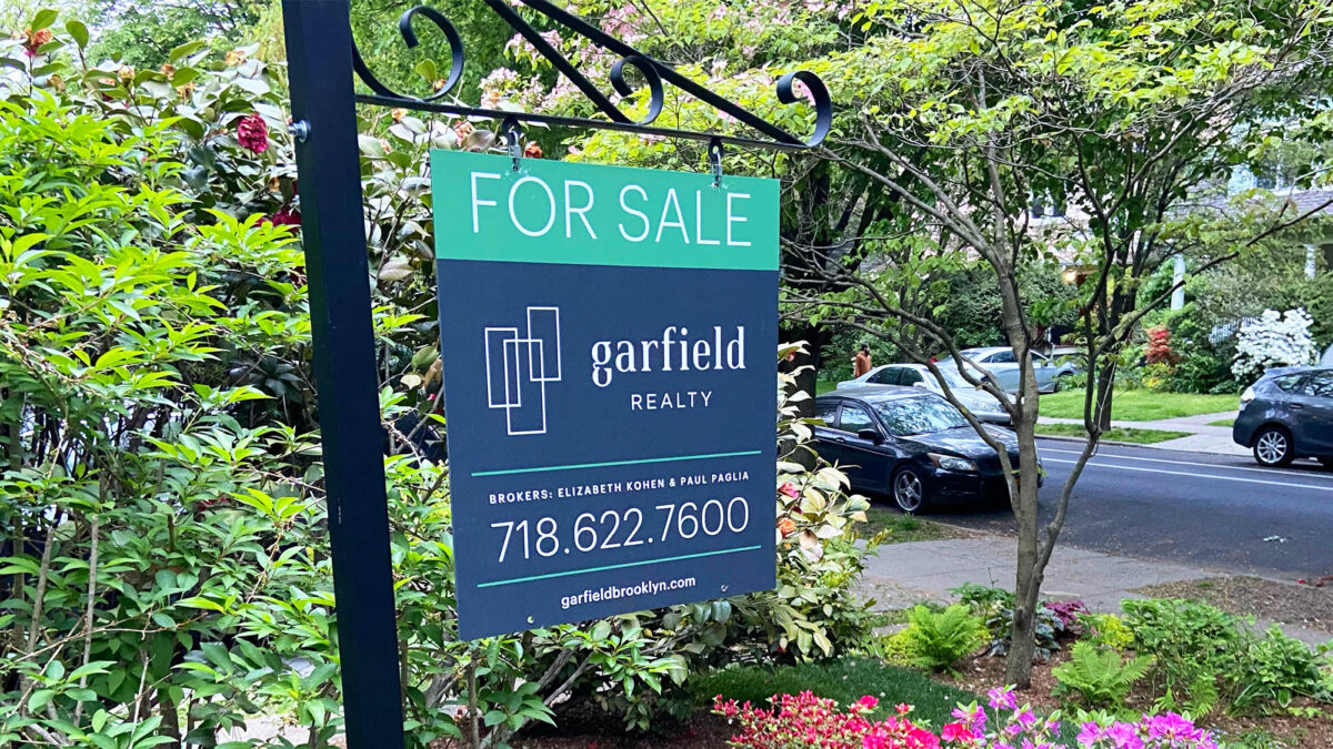 Garfield Realty For Sale sign with logo and phone number